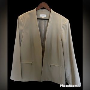 Calvin Klein tan blazer fully lined. SZ 24